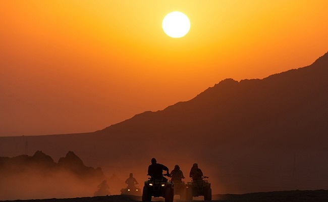 60 Minutes Quad Bike Dubai Desert with Camel Rides + Sand Boarding